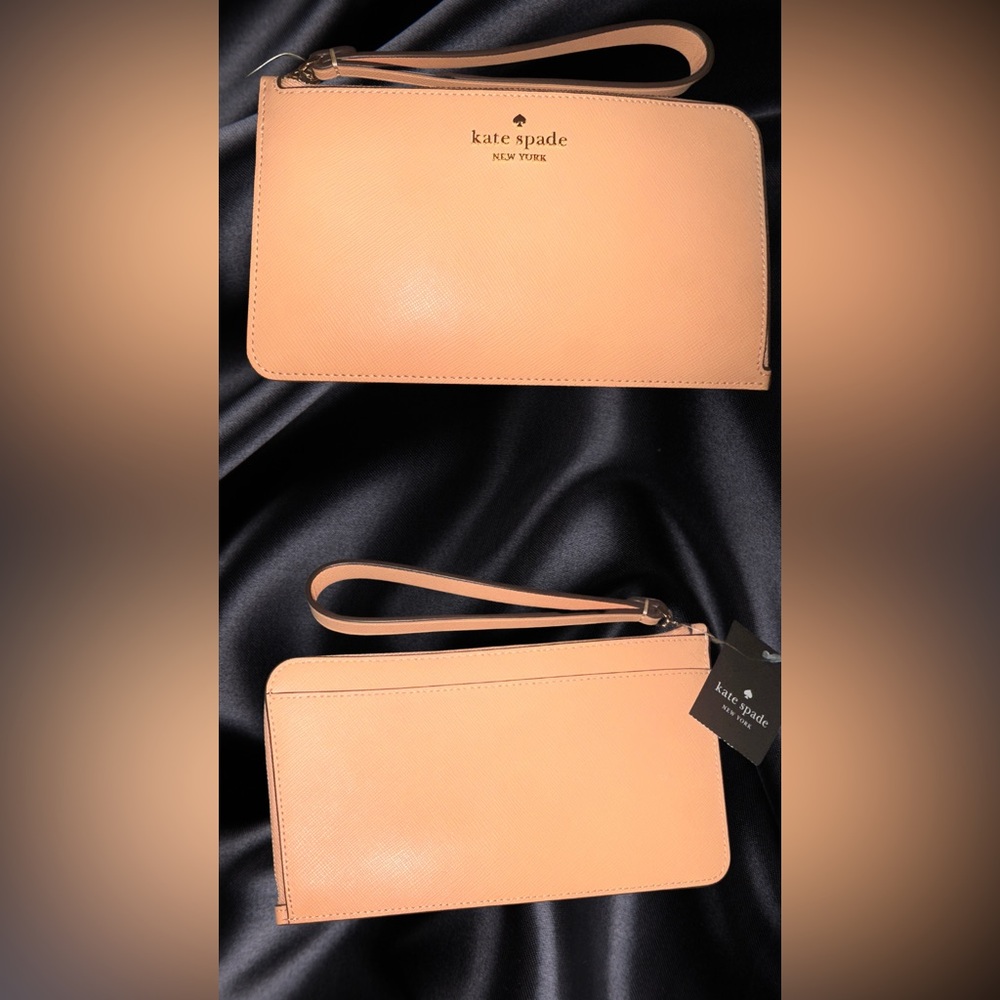 Kate Spade orange cream wristlet 🧡